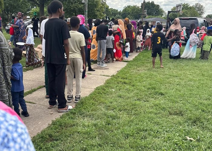 Happy diverse children holding school supplies and backpacks