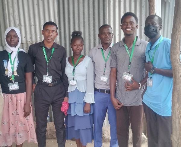 Global nonprofit volunteers working together on a community project