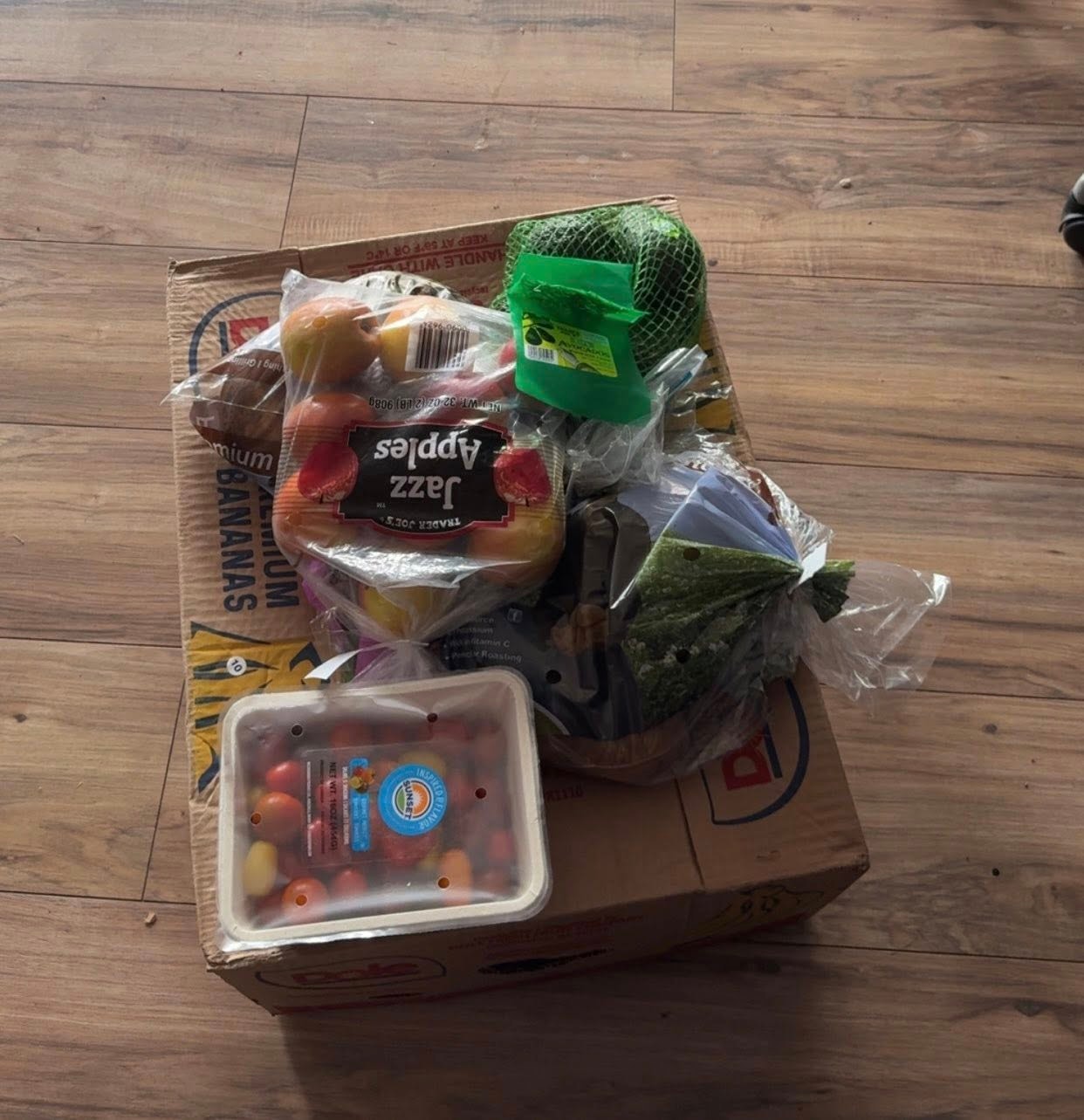 Fresh produce in a community grocery box