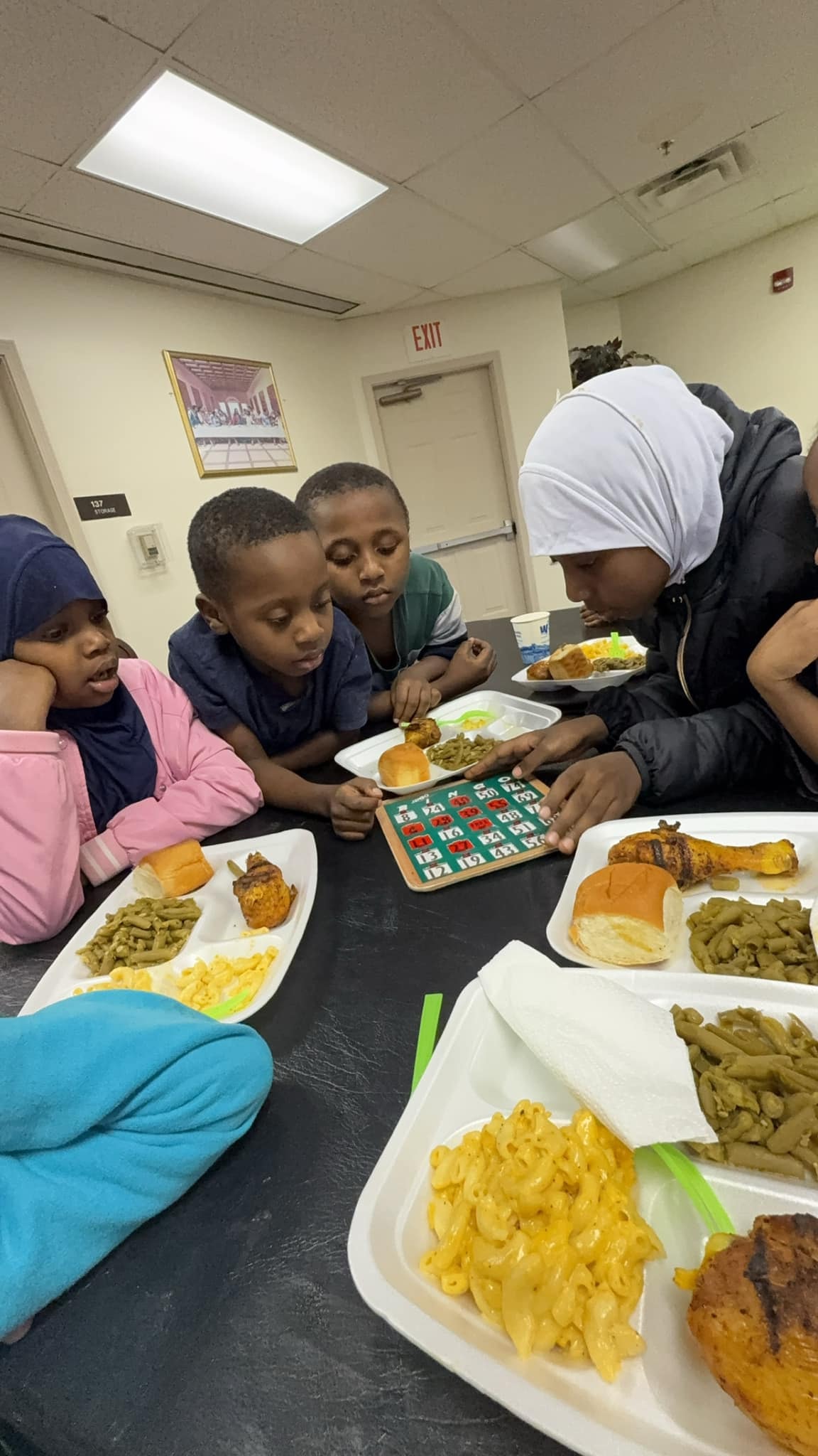 Family gathering and sharing a meal together
